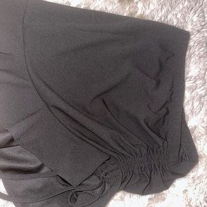 Black skirt, adjustable. Size large, new.